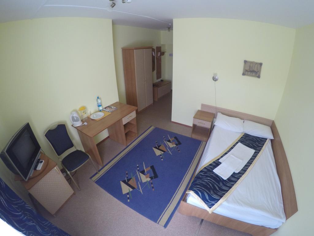 Kurmet Hotel Uralsk Habitación foto